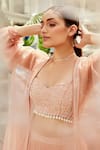 Buy_Nikita Vishakha_Peach Skirt Georgette Bralette Raw Silk Cape Organza Set With Puff Sleeve _Online_at_Aza_Fashions