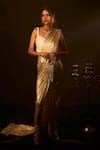 Shop_Tasuvure Indes_Beige Pleated Embellished Saia Metallic Pre-draped Saree With Blouse  _at_Aza_Fashions