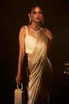 Shop_Tasuvure Indes_Beige Pleated Embellished Saia Metallic Pre-draped Saree With Blouse  _Online_at_Aza_Fashions