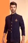Buy S&N By Shantnu Nikhil Blue Cotton, Poly Blend Crest Motif Placement Embroidered Bandhgala Online at Aza Fashions Buy_S&N By Shantnu Nikhil_Blue Cotton, Poly Blend Crest Motif Placement Embroidered Bandhgala_Online_at_Aza_Fashions