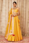 Buy_Shyam Narayan Prasad_Yellow Brocade Silk Leaf Neck Embroidered Lehenga Set _at_Aza_Fashions