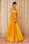 Shyam Narayan Prasad_Yellow Brocade Silk Leaf Neck Lehenga Set_Online_at_Aza_Fashions