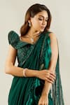 Adaara Couture_Green Raw Silk Asymmetric Embellished Pre-draped Saree With Blouse _at_Aza_Fashions