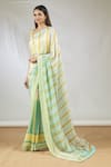 Buy_Vedika M_Green Satin Scoop Neck Stripe Print Saree With Blouse  _at_Aza_Fashions