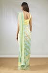 Shop_Vedika M_Green Satin Scoop Neck Stripe Print Saree With Blouse  _at_Aza_Fashions