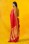 Shop_Weaver Story_Red Pure Katan Silk Woven Zari Butti Banarasi Handloom Saree _at_Aza_Fashions