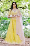 Buy_Salt And Spring_Yellow Net, Chanderi Mirror, Sequins V Neck Embroidered Lehenga Set _at_Aza_Fashions