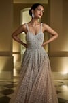 Shop_Seema Gujral_Beige Net Embroidery V Neck Flared Embellished Gown  _Online_at_Aza_Fashions