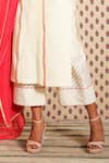 Nikasha_White Chanderi Cutwork Embroidered Round Handwoven Banarasi Kurta Set _at_Aza_Fashions