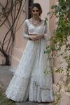 Astha Narang_White Main Material Netlining Semi Crepe V Neck Embroidered Lehenga Set _Online_at_Aza_Fashions
