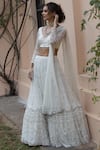 Buy_Astha Narang_White Main Material Netlining Semi Crepe V Neck Embroidered Lehenga Set _Online_at_Aza_Fashions