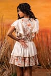 Shop_Label Reyya_White Rayon Lurex Floral Print, Crochet Lace And Sequin Work Surplice Tiered Dress _at_Aza_Fashions