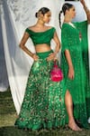 Shop Tisha Saksena Green Blouse Dupion Lehenga Raw Floral Embroidered Draped And Set at Aza Fashions Shop_Tisha Saksena_Green Blouse Dupion Lehenga Raw Floral Embroidered Draped And Set _at_Aza_Fashions