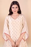 Shop_Jajobaa_Beige Assam Silk Woven V Neck Asymmetric Kurta And Dhoti Pant Set _Online_at_Aza_Fashions