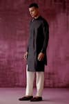 Pouli Pret_Black Cotton Satin Plain Asymmetric Kurta _Online_at_Aza_Fashions