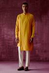 Pouli Pret_Yellow Cotton Satin Asymmetric Overlap Kurta _Online_at_Aza_Fashions