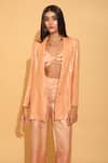 Buy_TORQADORN_Peach Satin Embroidery Sequin Jacket Lapel Collar Blazer And Pant Set _at_Aza_Fashions