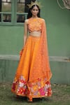 Buy_Taavare_Orange Raw Silk Embroidered Wildflower Round Bridal Lehenga Set _at_Aza_Fashions