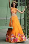 Shop_Taavare_Orange Raw Silk Embroidered Wildflower Round Bridal Lehenga Set _at_Aza_Fashions