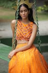 Taavare_Orange Raw Silk Embroidered Wildflower Round Bridal Lehenga Set _Online_at_Aza_Fashions