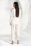 Shop_Twinkle Hanspal_White Mashru Silk Hand Embroidered Floral Lapel Blazer And Pant Set  _at_Aza_Fashions