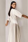 Shop_Twinkle Hanspal_White Cotton Poplin Solid V Neck Front Tie Up Dress _Online_at_Aza_Fashions