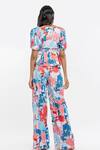 Shop_Mandira Wirk_Pink Cotton Tropical Motifs V Neck Printed Wrap Top And Pant Set_at_Aza_Fashions