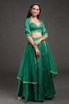 Buy_Talking Threads_Emerald Green Blouse And Lehenga Brocade Silk Woven & Embroidery Set  _at_Aza_Fashions