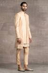 Tarun Tahiliani_Peach Kurta - Silk Cotton Textured Sherwani Set_Online_at_Aza_Fashions