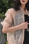 Shop Talking Threads Peach Silk Organza Embroidered Bomber Jacket Online at Aza Fashions Shop_Talking Threads_Peach Silk Organza Embroidered Bomber Jacket _Online_at_Aza_Fashions