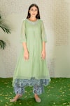 Buy_NAAZ BY NOOR_Green Chanderi Embroidered Thread Work Round Asymmetric Kurta And Palazzo Set _at_Aza_Fashions