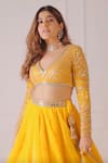 Shop_Vvani by Vani Vats_Yellow Lehenga And Blouse Georgette Dupatta Net Lining  Mirror Bridal Set _at_Aza_Fashions