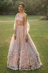 Buy_Angad Singh_Peach Net Lining Satin Embroidery Asymmetric Lehenga Set _at_Aza_Fashions