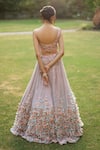 Shop_Angad Singh_Peach Net Lining Satin Embroidery Asymmetric Lehenga Set _at_Aza_Fashions