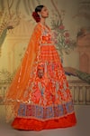 Buy_Aayushi Maniar_Orange Anarkali Crepe Silk Printed And Hand Embroidered Patola Lehenga Set _at_Aza_Fashions