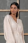 Urvashi Kaur_Peach Handwoven Silk Linen Midi Dress_Online_at_Aza_Fashions