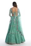 Shop_Vvani by Vani Vats_Green Georgette Sweetheart Neck Embellished Tiered Bridal Lehenga Set _at_Aza_Fashions