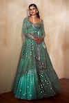 Buy_Vvani by Vani Vats_Green Georgette Sweetheart Neck Embellished Tiered Bridal Lehenga Set _at_Aza_Fashions