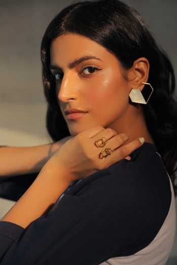 Shop_Varnika Arora_Gold Plated Cut Work Heart Motif Statement Stud Earrings _at_Aza_Fashions