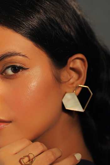 Varnika Arora_Gold Plated Cut Work Heart Motif Statement Stud Earrings _Online_at_Aza_Fashions