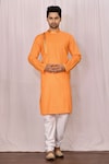 Buy_Samyukta Singhania_Orange Cotton Plain Patch Work Kurta Set_at_Aza_Fashions