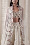 VARUN NIDHIKA_White Silk Organza Lehenga Set_at_Aza_Fashions