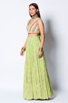 Rishi and Vibhuti_Green Georgette And Crepe Embellishment Floral Lea Love Blouse & Lehenga Set _Online_at_Aza_Fashions