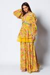 Rishi and Vibhuti_Yellow Crepe Print And Embellishment Shell Marigold Peplum Tunic & Flared Pant Set _Online_at_Aza_Fashions