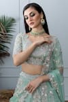 Varun Chakkilam_Green Organza Boat Hand Embroidered Bridal Lehenga Set  _at_Aza_Fashions