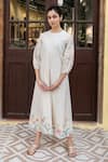 Buy Vaayu White Muslin Cotton Floral Motifs Crew Neck Bishop Sleeves Kurta at Aza Fashions Buy_Vaayu_White Muslin Cotton Floral Motifs Crew Neck Bishop Sleeves Kurta _at_Aza_Fashions