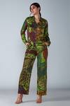 Buy_Saaksha & Kinni_Green Satin Abstract Bird Print Trouser_at_Aza_Fashions
