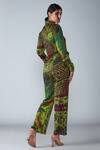 Shop_Saaksha & Kinni_Green Satin Abstract Bird Print Trouser_at_Aza_Fashions