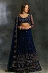 Buy_ASTHA NARANG_Midnight Blue Net Sequin Shimmer Lehenga_at_Aza_Fashions