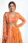 Shop_Paulmi and Harsh_Orange Georgette And Net & Embroidery Jungle V Neck Lehenga Set _at_Aza_Fashions